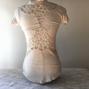 Free People lace cutout T-shirt.